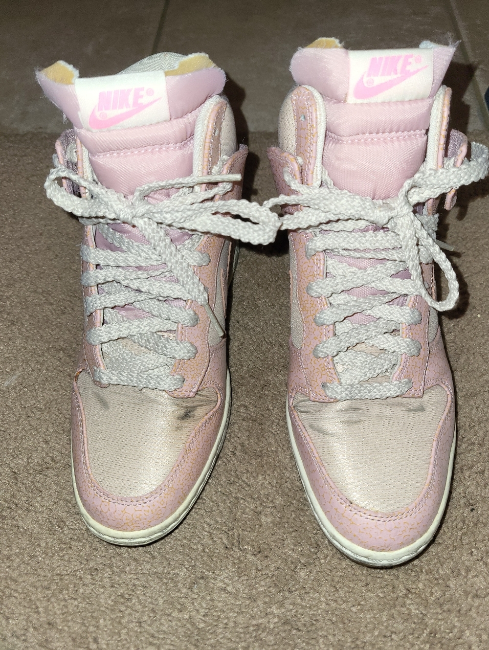 Nike Women’s Light Pink High-Top Sneakers With Hidden Wedge